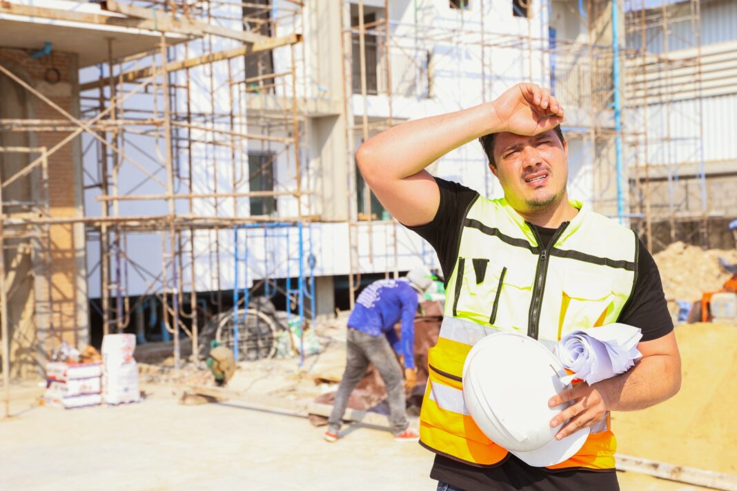 a foreman working outdoors during a heatwave