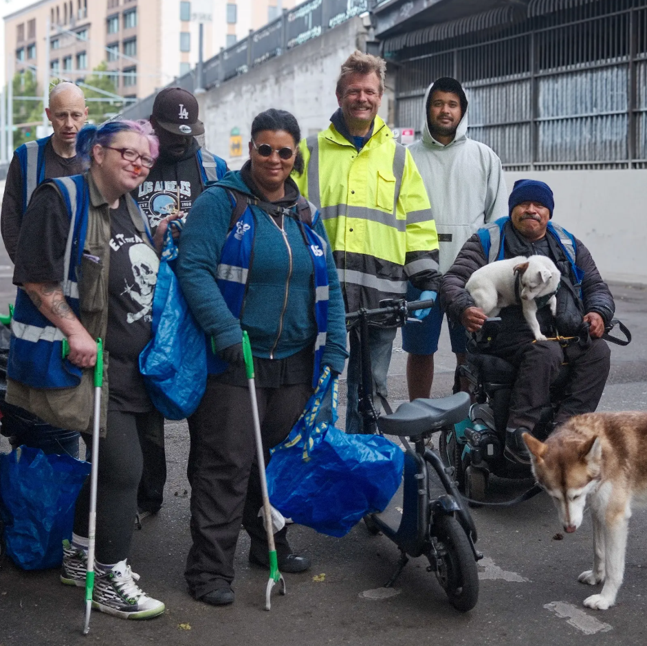 a team of Ground Score workers pose for a photo mid-route