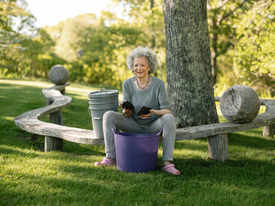 Monina Von Opel holds homemade compost