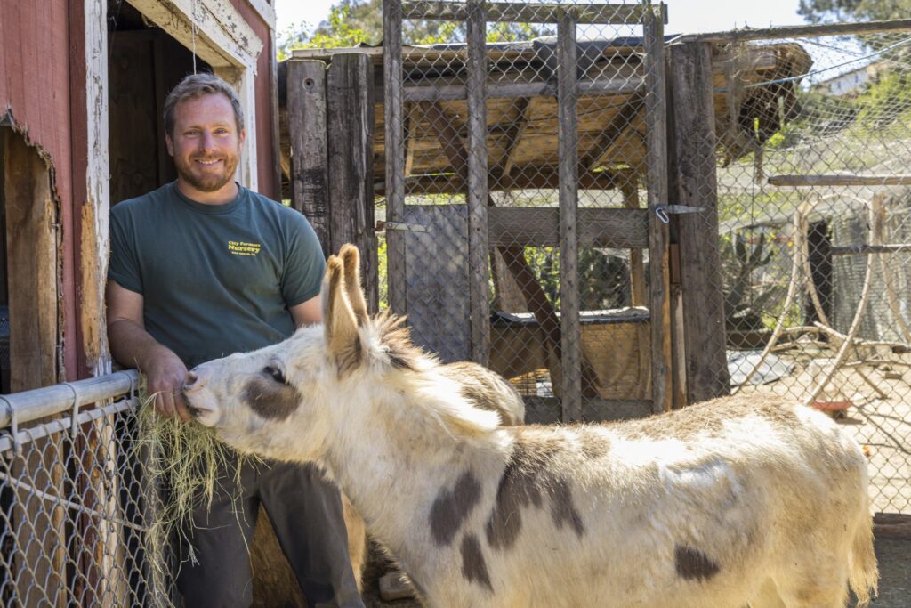 Sam Tall and donkey Alfalfa