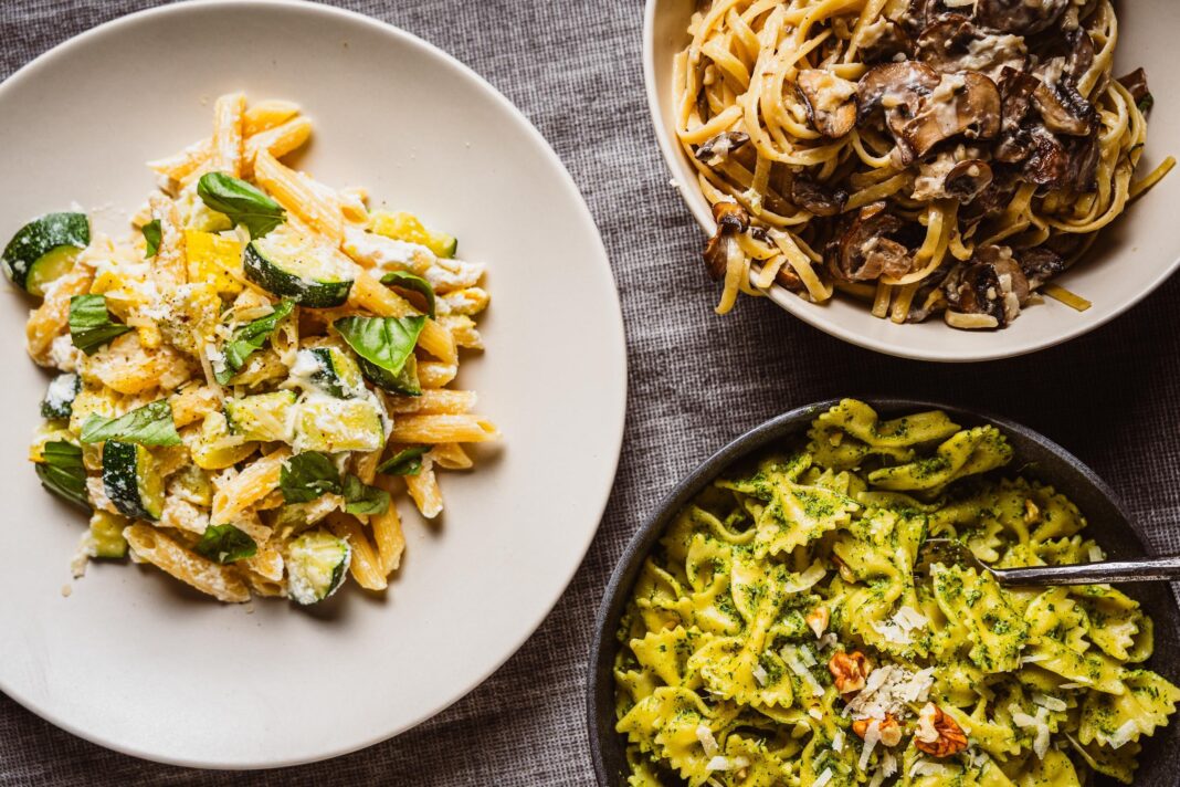 three different pasta served in bowls
