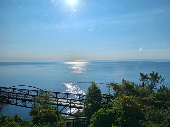 a picture out of a train window looking over Ottawa