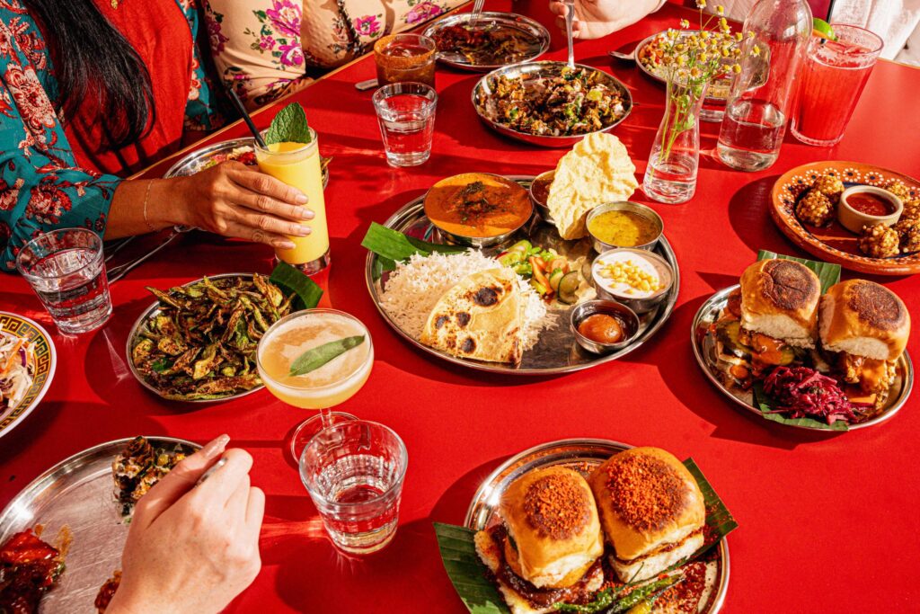 a table full of food at chai pani in asheville
