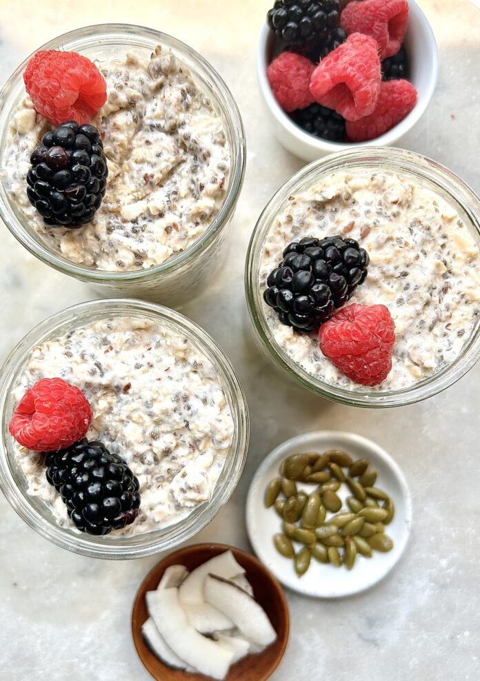 porridge served in bowls topped with berries