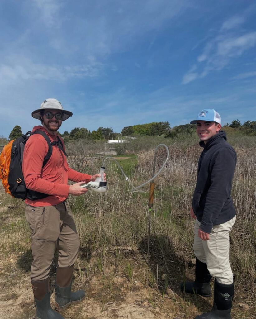 two men collecting groundwater samples