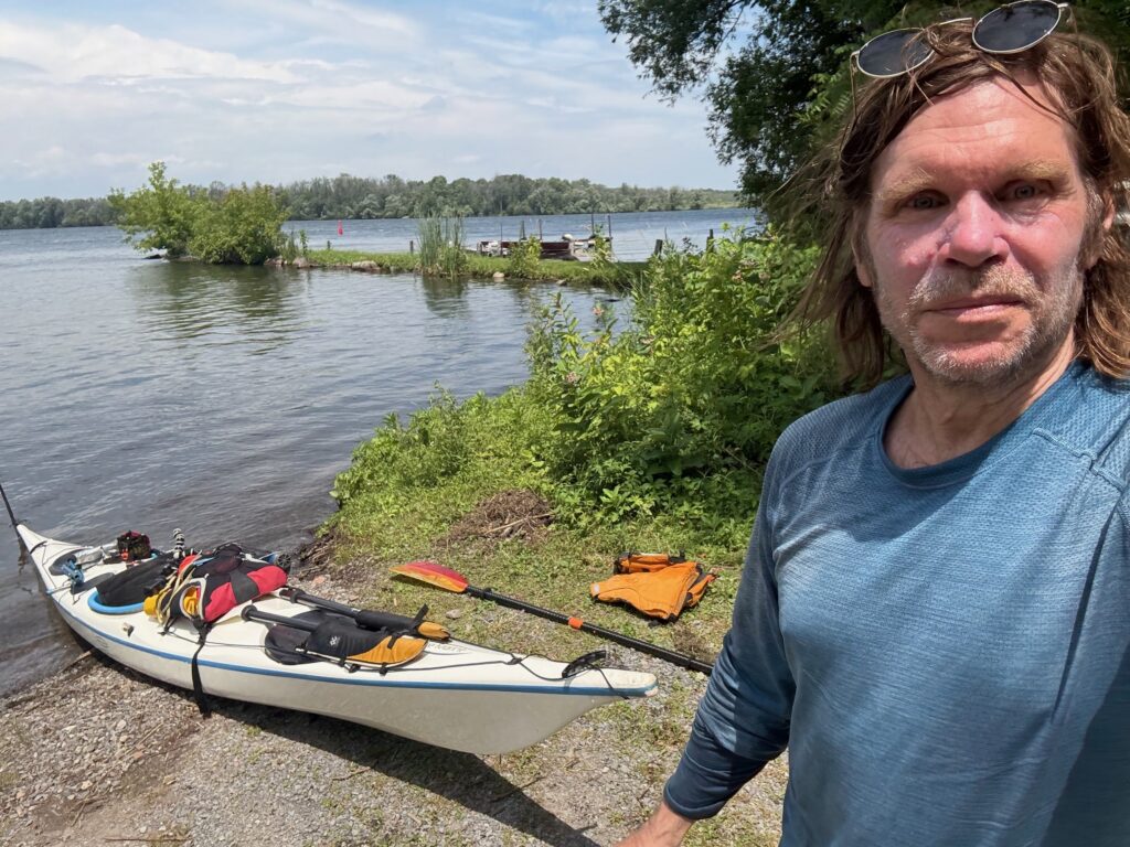 a man and his kayak
