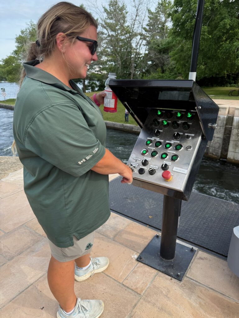 Erica Sortberg, lockmaster @ Newboro, with control station for gates & gate sluice