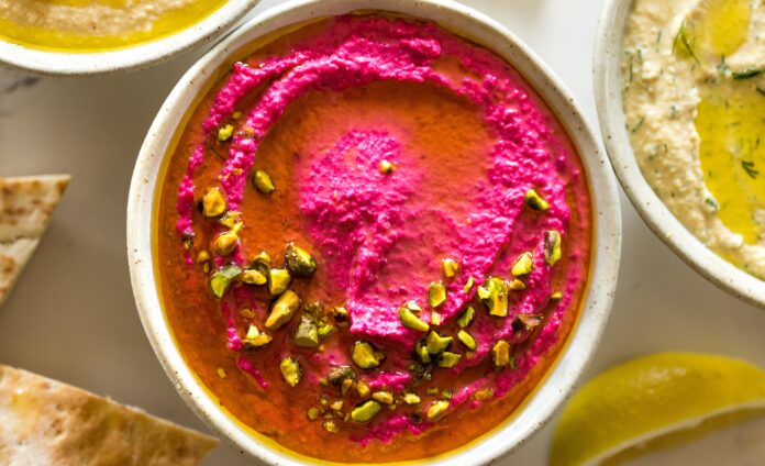 beat hummus served with veggies