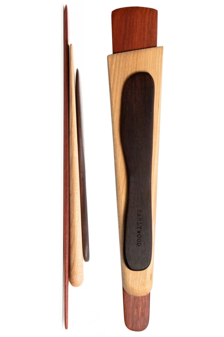 A set of wooden kitchen utensils in three different types of wood.
