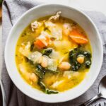 tuscan white bean and chicken soup served in a bowl