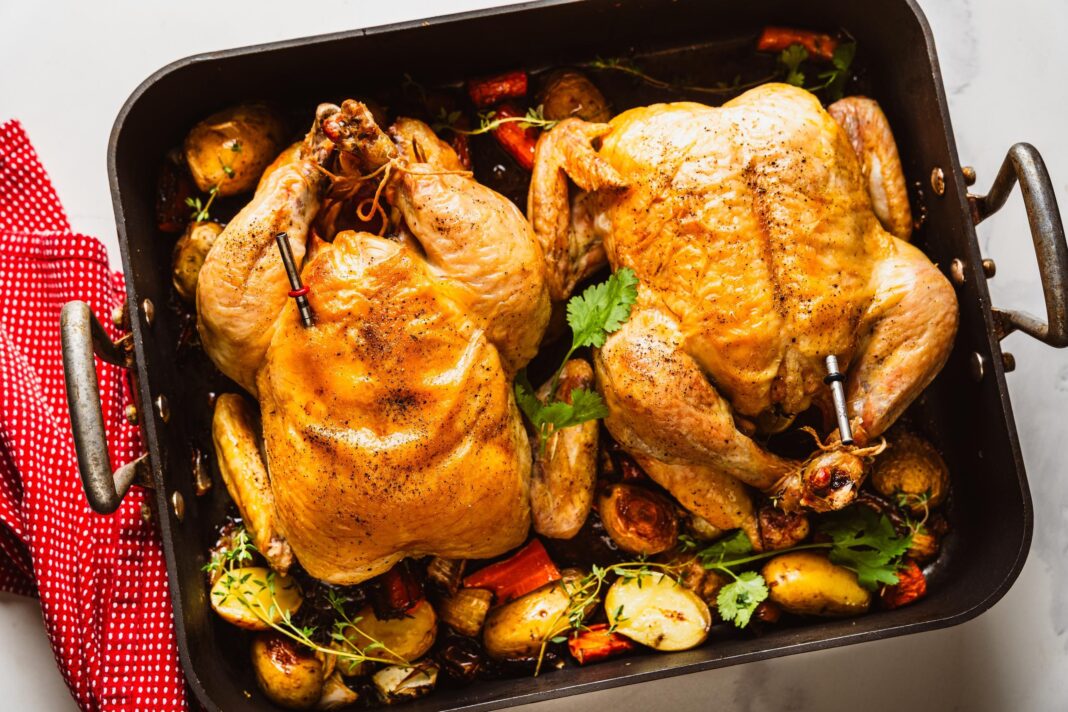 two chickens in a pan