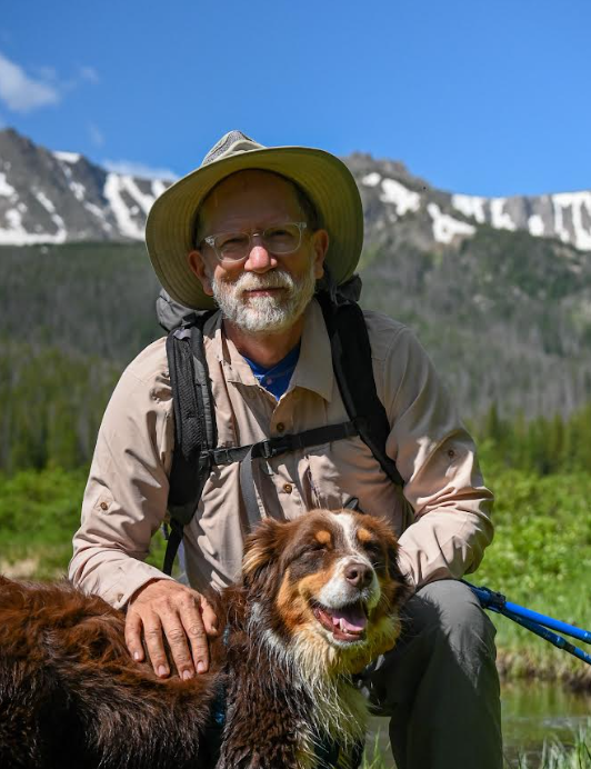 mark easter hiking with his dog