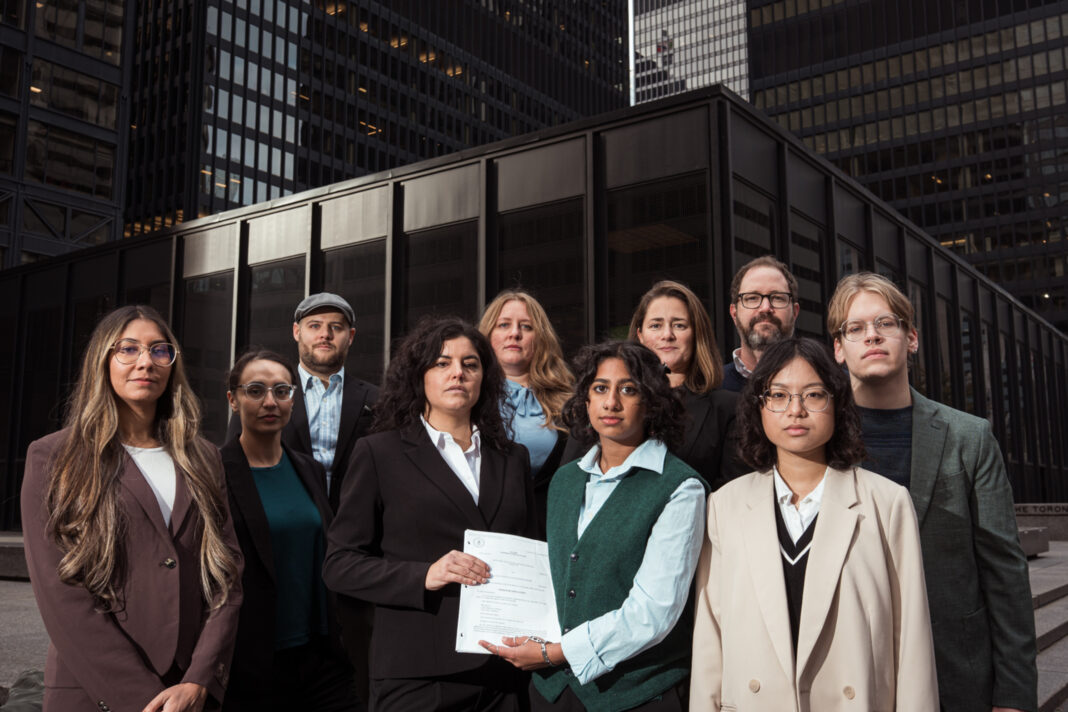 four young canadians in front of a courthouse