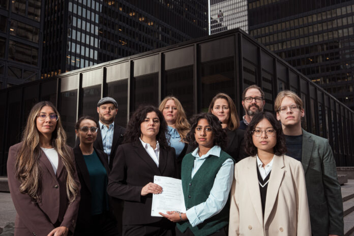 four young canadians in front of a courthouse