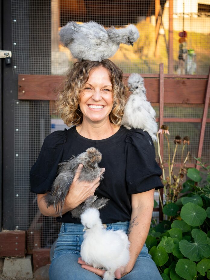 laura mclean with her chickens