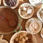 a table full of ingredients you need to make homemade hot chocolate