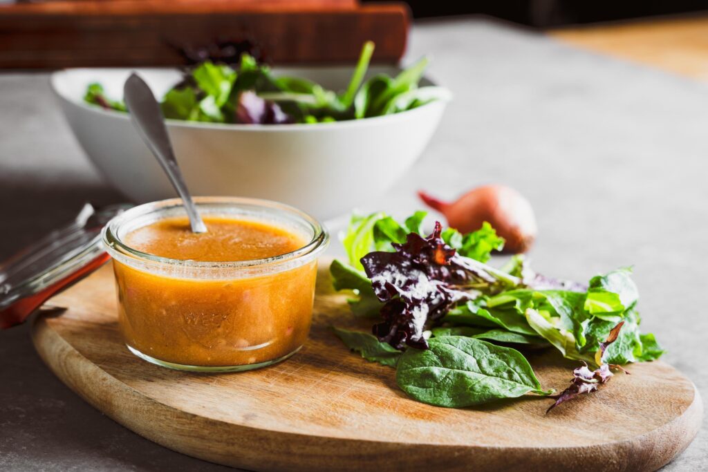 vinaigrette with pieces of lettuce