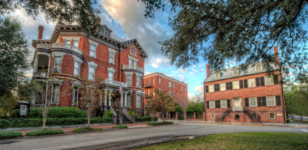 a street view of historic homes in savannah