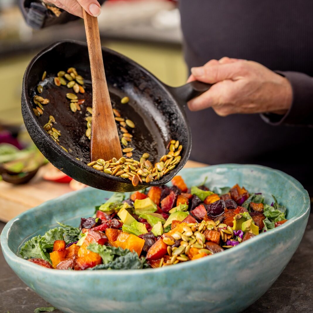kale salad with roasted veggies mixed in
