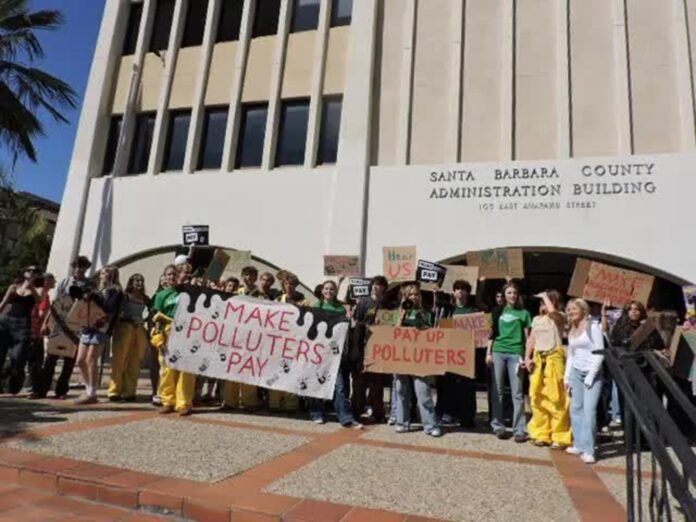 A student march outside of the santa barbara county administration building