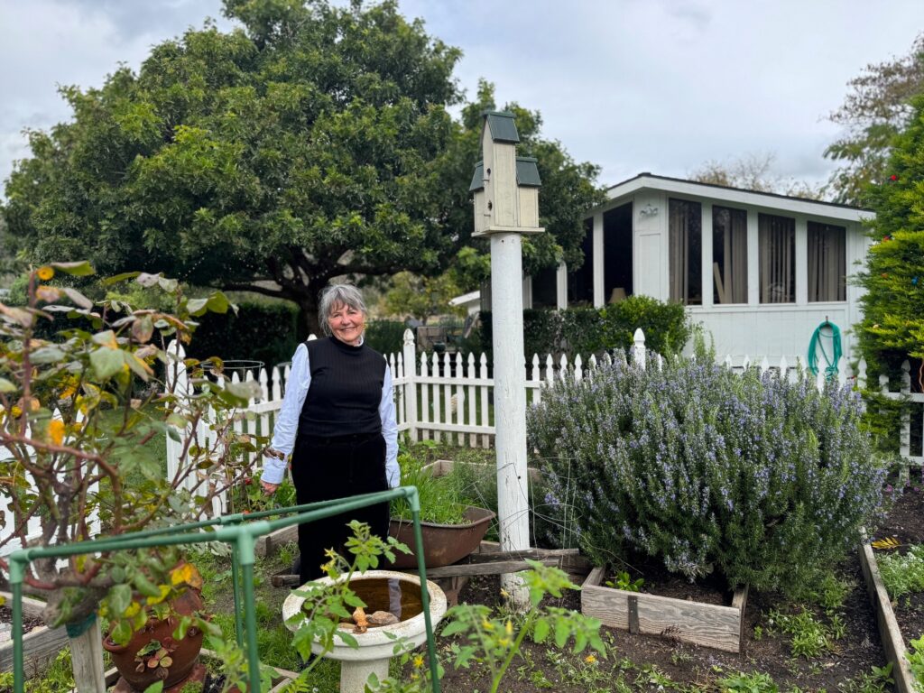 susan branch in her home garden
