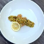 platted pan-fried abalone with preserved lemon and pistachio gremolata