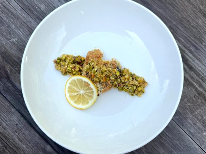 platted pan-fried abalone with preserved lemon and pistachio gremolata