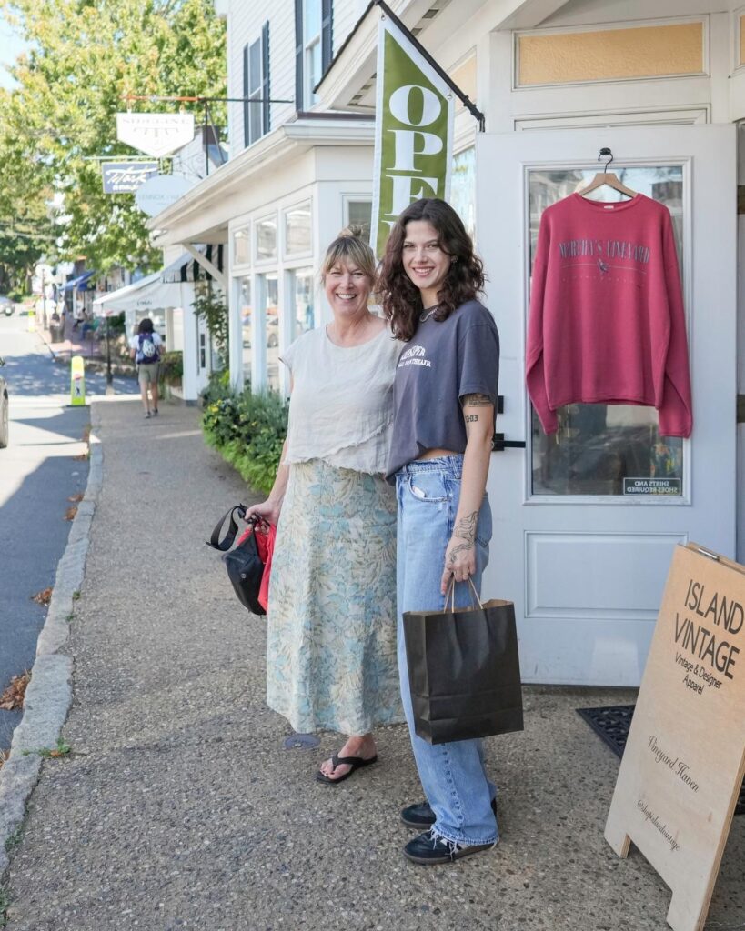 Leslie and Char stand outside of Island Vintage