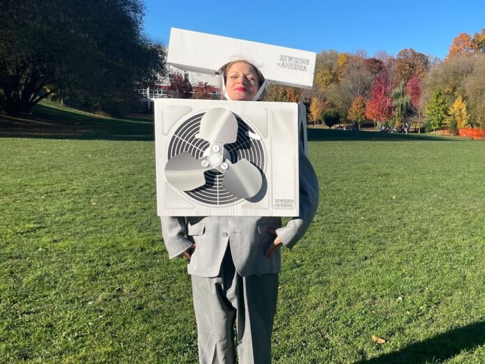 Sarah Lazarovic dressed as a heat pump