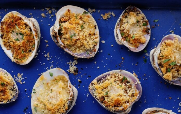 clams cracktino on a blue tray