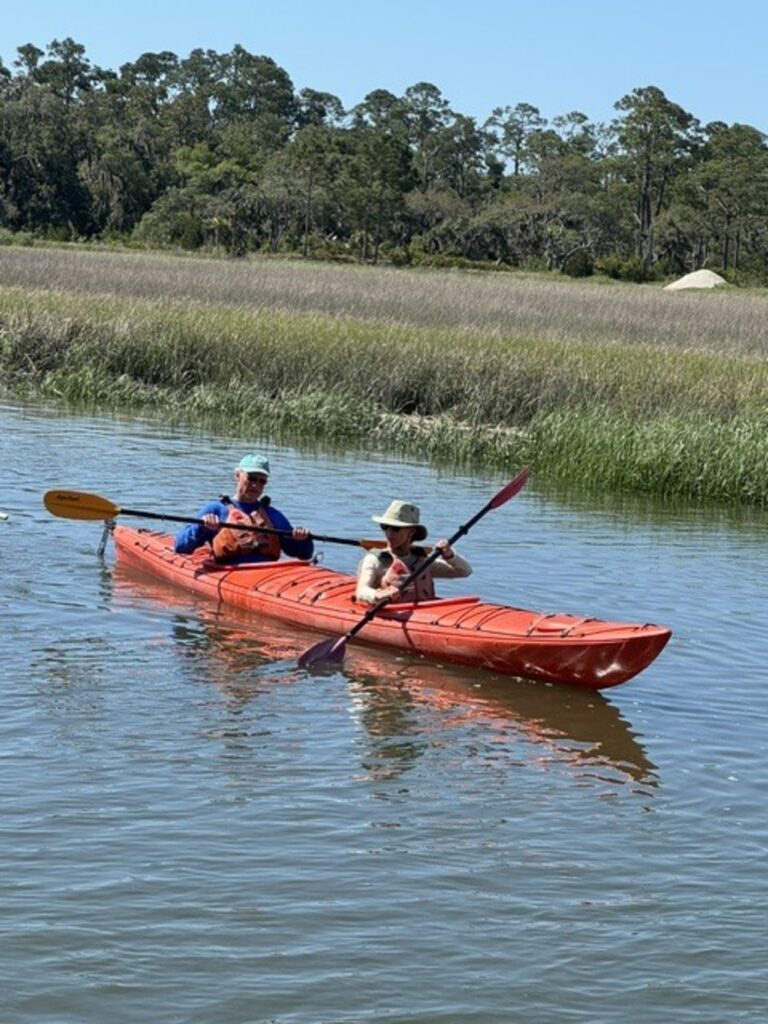 tourists kayak along the Altamaha River
