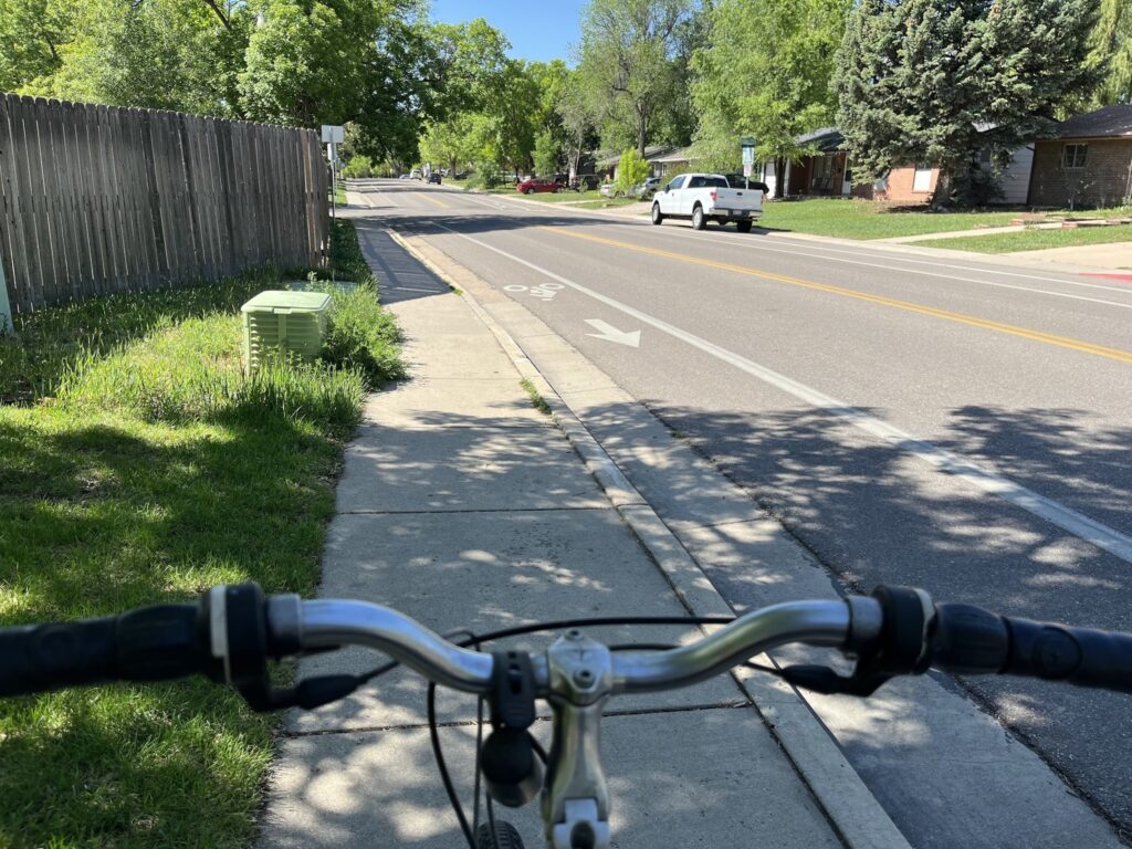 zanny riding down the street on her bike