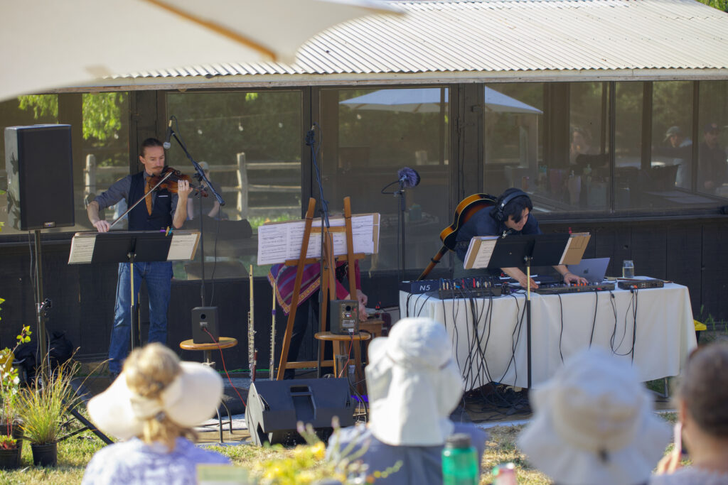 violinist Darrell Conrad performing with Nathan Sherwood Liang during his artists residency