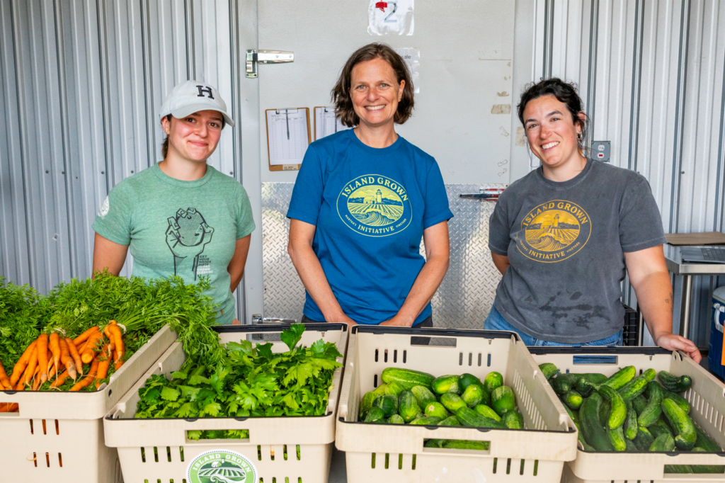 IGI Co-Executive Director Caroline Pam (center) with Gleaning and Distribution Assistant Jen Novick (left) and Distribution Manager Ali Gerry (right)