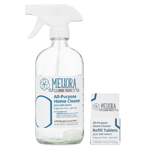 a glass spray bottle and a small cardboard carton, labeled Meliora Cleaning Products All-Purpose Home Cleaner and Refill Tablets