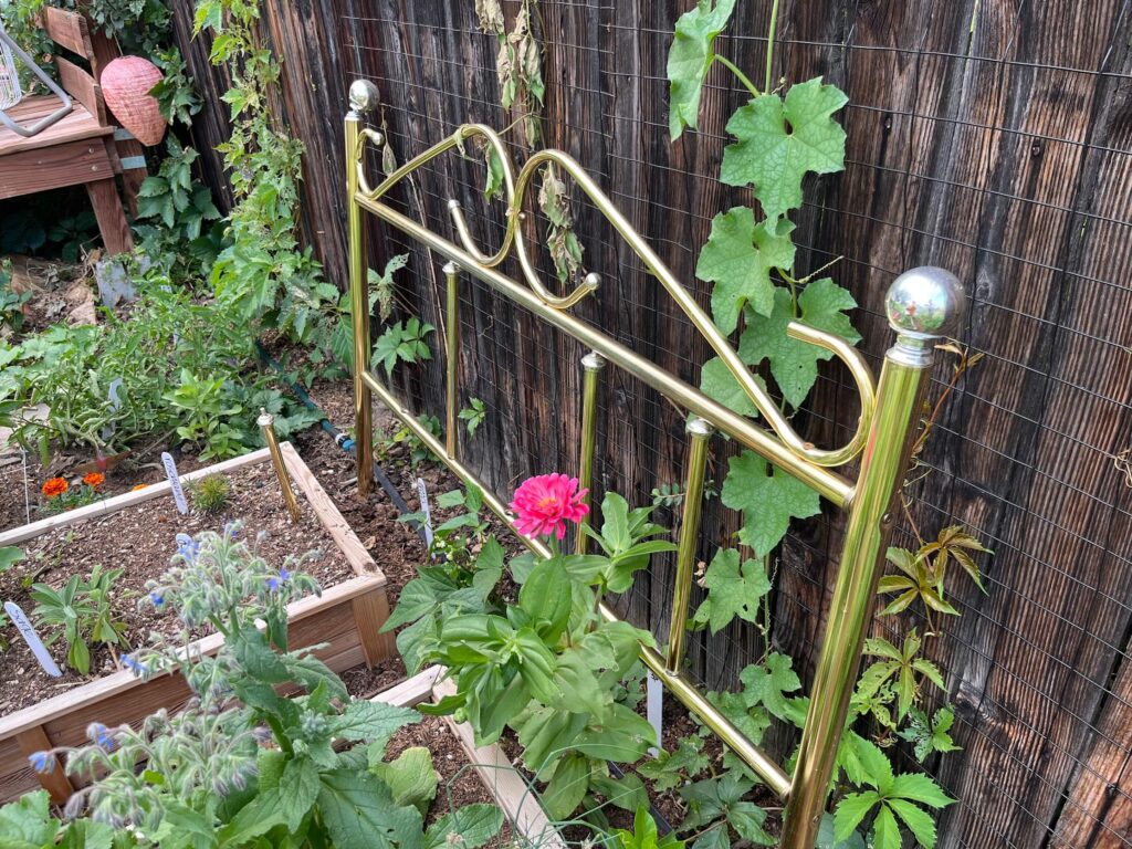 christina repurposed an old headboard in her garden